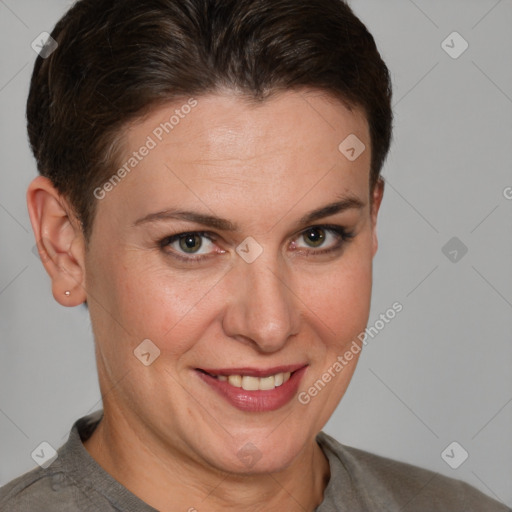 Joyful white adult female with short  brown hair and grey eyes