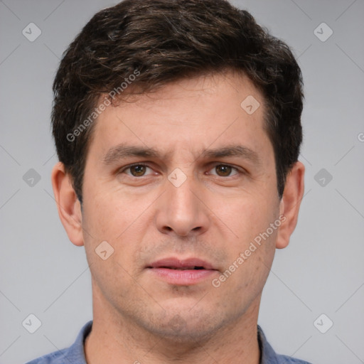 Neutral white adult male with short  brown hair and brown eyes