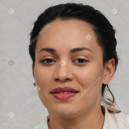 Joyful latino young-adult female with short  black hair and brown eyes