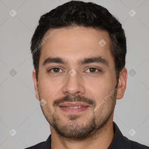 Joyful white young-adult male with short  black hair and brown eyes