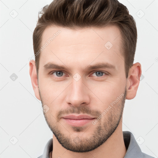 Neutral white young-adult male with short  brown hair and grey eyes