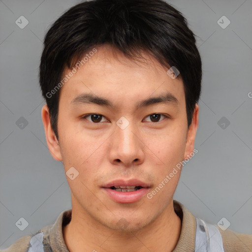 Neutral asian young-adult male with short  brown hair and brown eyes