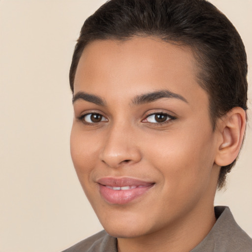 Joyful white young-adult female with short  brown hair and brown eyes