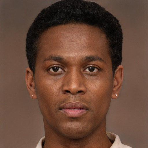 Neutral latino young-adult male with short  brown hair and brown eyes