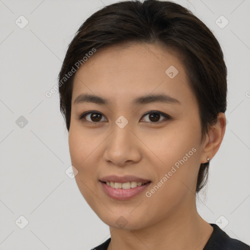 Joyful asian young-adult female with medium  brown hair and brown eyes