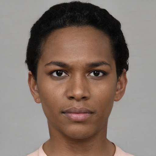 Neutral black young-adult female with short  black hair and brown eyes