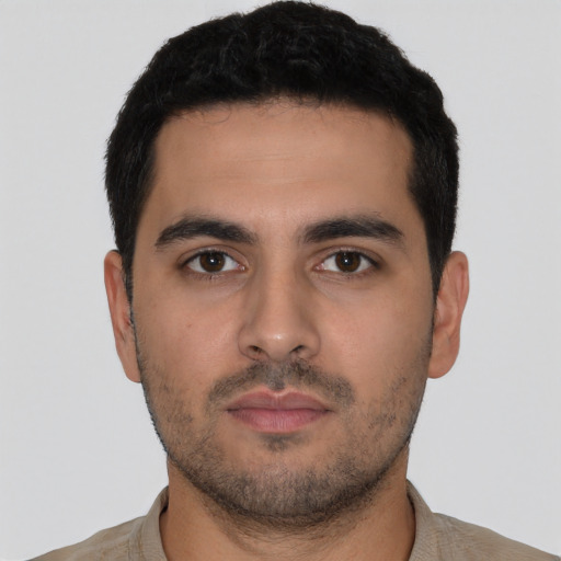 Neutral latino young-adult male with short  black hair and brown eyes