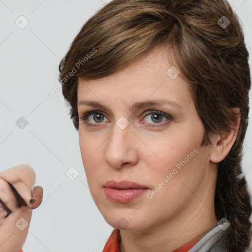 Neutral white young-adult female with medium  brown hair and brown eyes