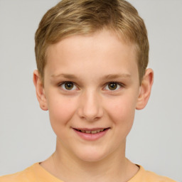 Joyful white child male with short  brown hair and brown eyes