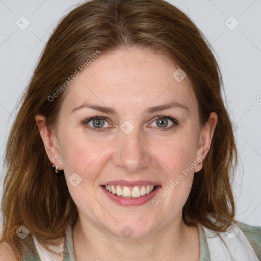 Joyful white young-adult female with medium  brown hair and blue eyes