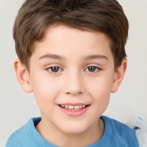 Joyful white child male with short  brown hair and brown eyes