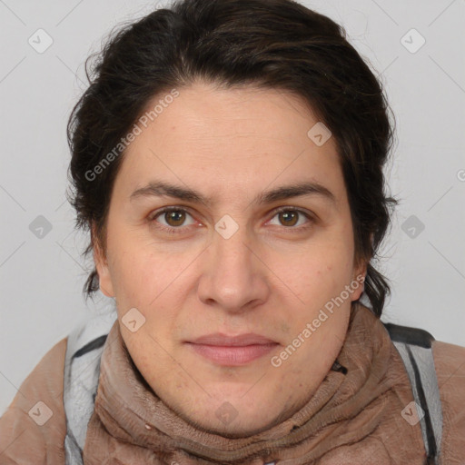 Joyful white adult female with short  brown hair and brown eyes