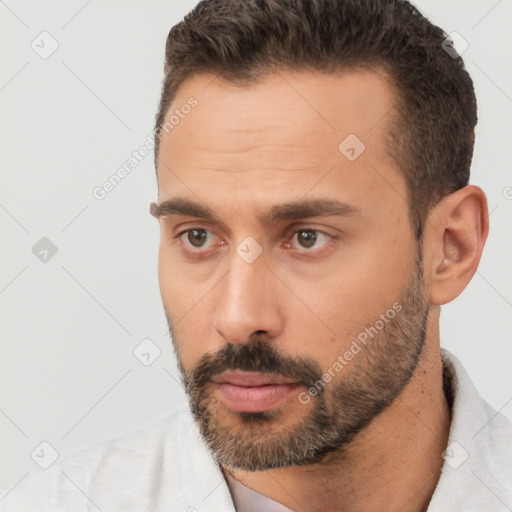 Neutral white young-adult male with short  brown hair and brown eyes