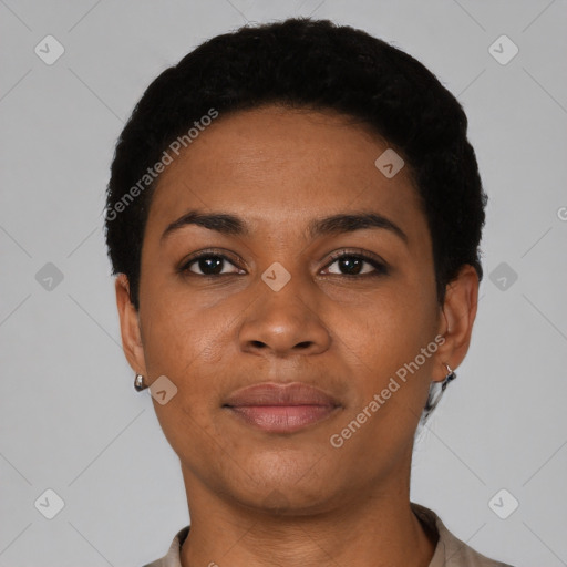 Joyful black young-adult female with short  black hair and brown eyes