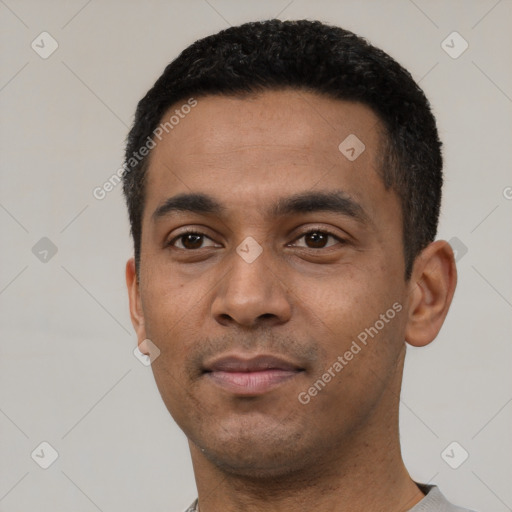Neutral latino young-adult male with short  black hair and brown eyes
