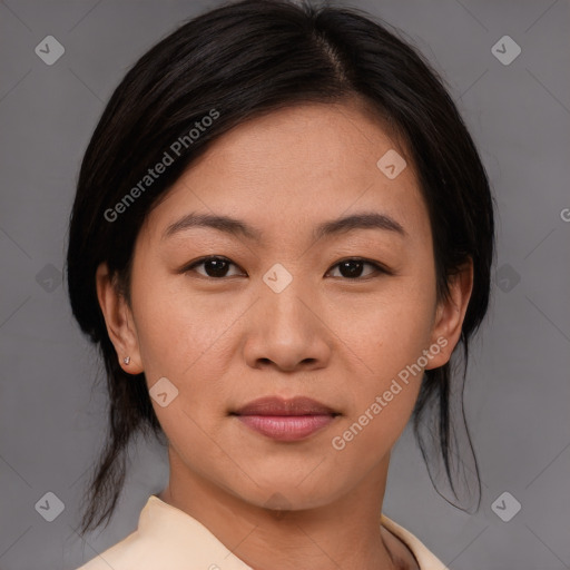 Joyful asian young-adult female with medium  brown hair and brown eyes