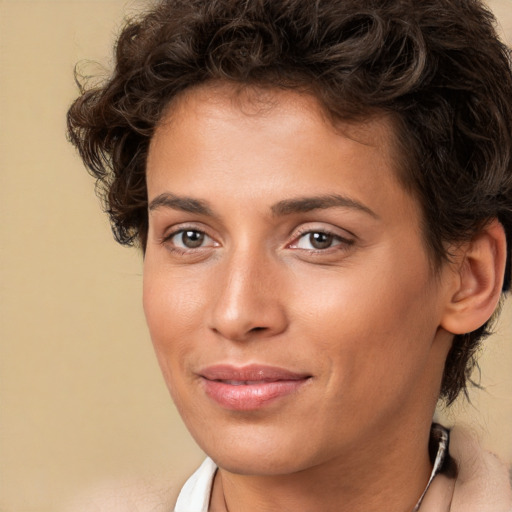 Joyful white young-adult female with short  brown hair and brown eyes