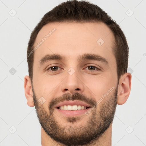 Joyful white young-adult male with short  brown hair and brown eyes