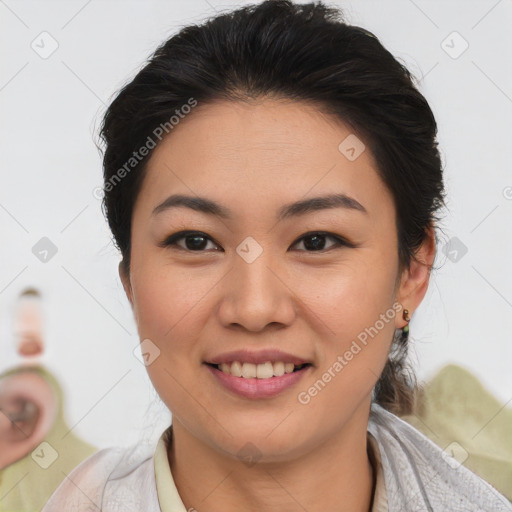 Joyful asian young-adult female with medium  brown hair and brown eyes