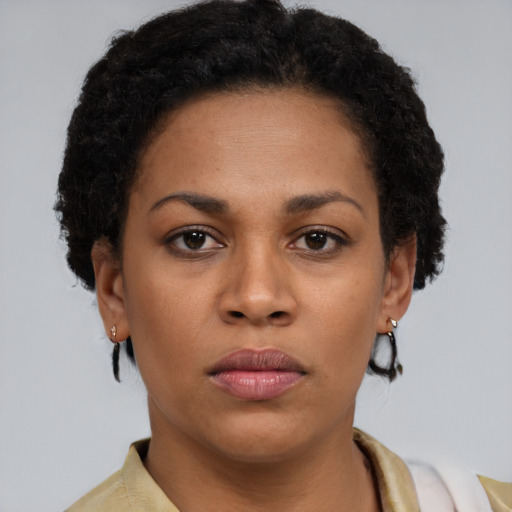 Neutral black young-adult female with short  brown hair and brown eyes