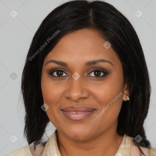Joyful black young-adult female with medium  brown hair and brown eyes