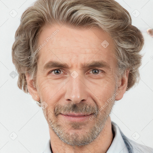 Joyful white adult male with short  brown hair and grey eyes