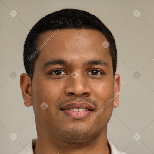 Joyful latino young-adult male with short  brown hair and brown eyes