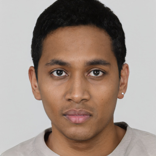 Neutral black young-adult male with short  black hair and brown eyes