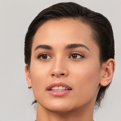 Joyful white young-adult female with medium  brown hair and brown eyes