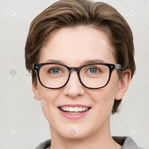 Joyful white young-adult female with short  brown hair and grey eyes