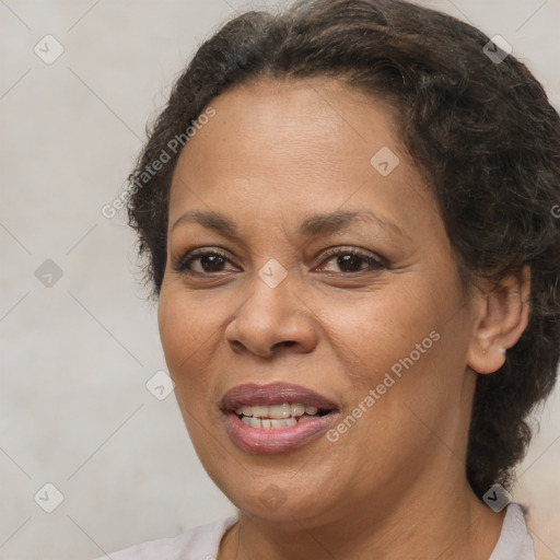 Joyful black adult female with short  brown hair and brown eyes