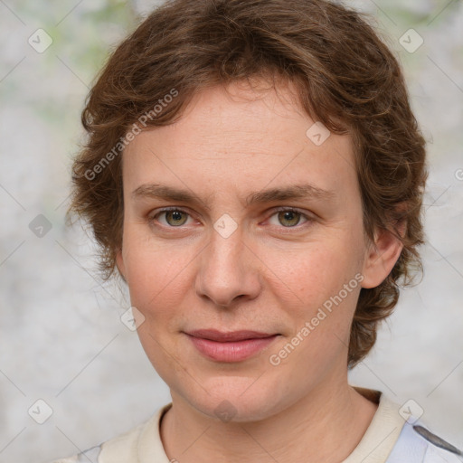 Joyful white young-adult female with medium  brown hair and green eyes