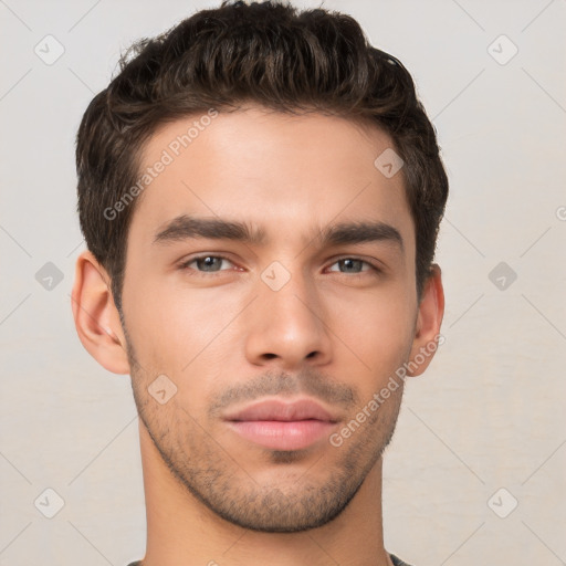 Neutral white young-adult male with short  brown hair and brown eyes