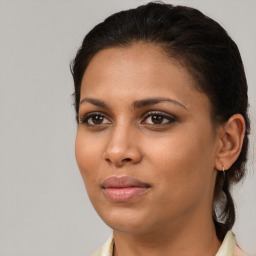 Joyful black young-adult female with medium  brown hair and brown eyes