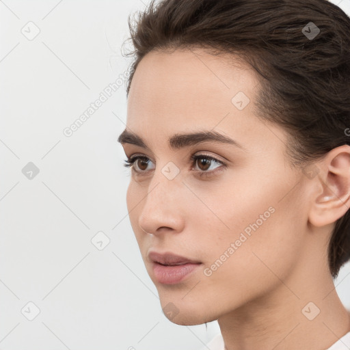 Neutral white young-adult female with medium  brown hair and brown eyes