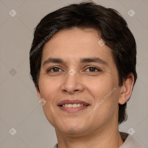 Joyful white adult female with short  brown hair and brown eyes