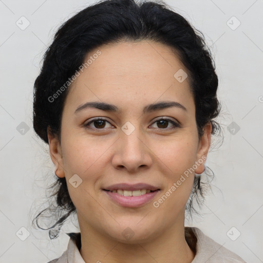 Joyful latino young-adult female with medium  brown hair and brown eyes