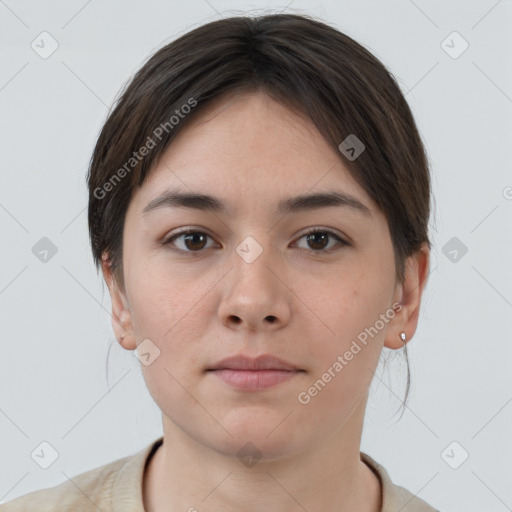 Neutral white young-adult female with short  brown hair and brown eyes