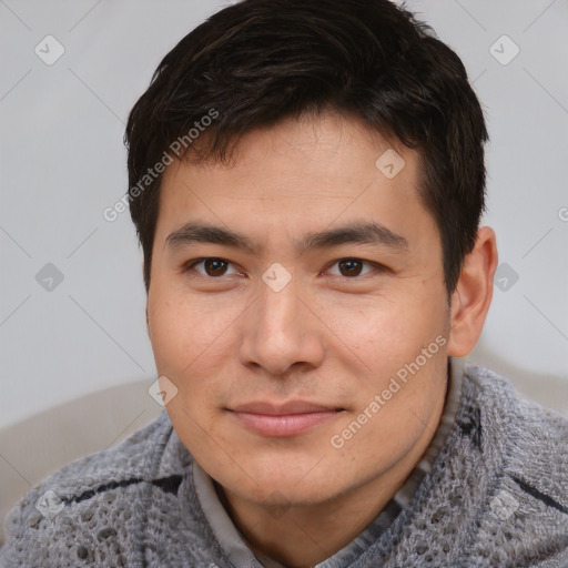 Joyful asian young-adult male with short  brown hair and brown eyes