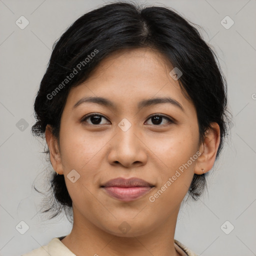 Joyful latino young-adult female with medium  brown hair and brown eyes