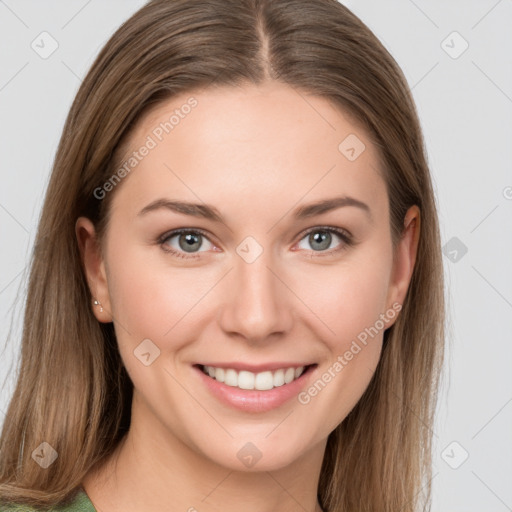 Joyful white young-adult female with long  brown hair and green eyes