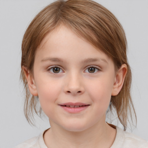 Joyful white child female with medium  brown hair and grey eyes