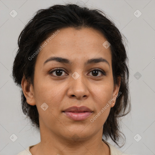 Joyful asian adult female with medium  brown hair and brown eyes