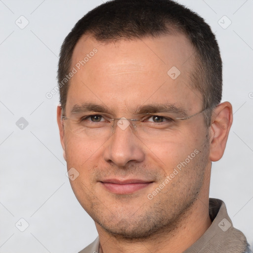 Joyful white adult male with short  brown hair and brown eyes