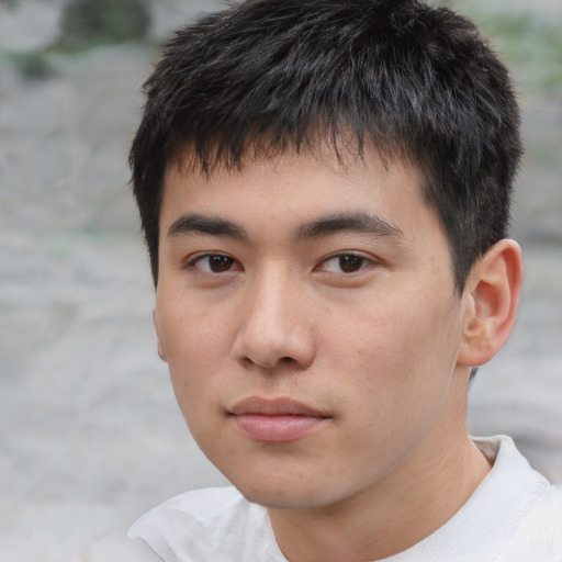 Neutral asian young-adult male with short  brown hair and brown eyes