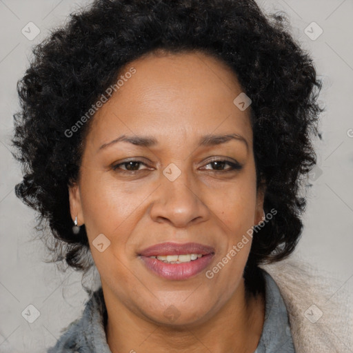 Joyful black adult female with short  brown hair and brown eyes