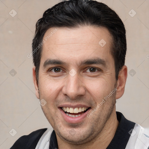 Joyful white adult male with short  brown hair and brown eyes