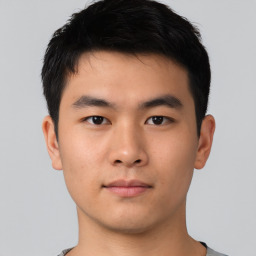 Neutral asian young-adult male with short  black hair and brown eyes