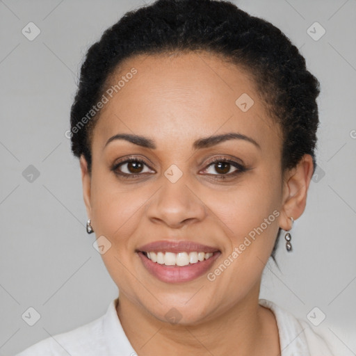 Joyful latino young-adult female with short  brown hair and brown eyes