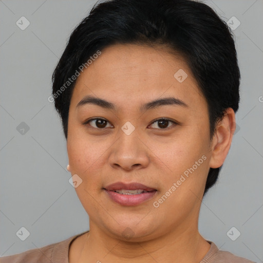 Joyful asian young-adult female with short  brown hair and brown eyes